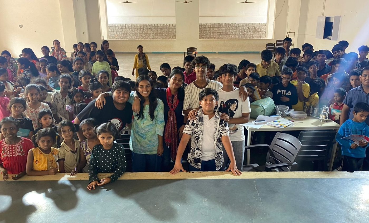 The Mosaic team with children at Agape Orphanage
